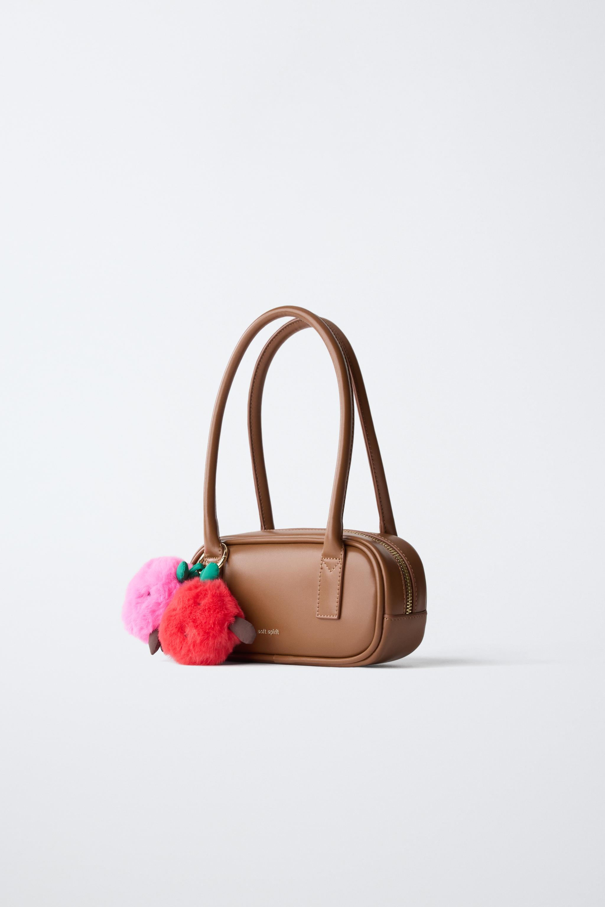 SAC À ÉPAULE POMPONS